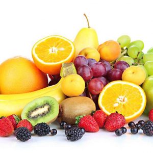 Fresh fruits and berries isolated on white