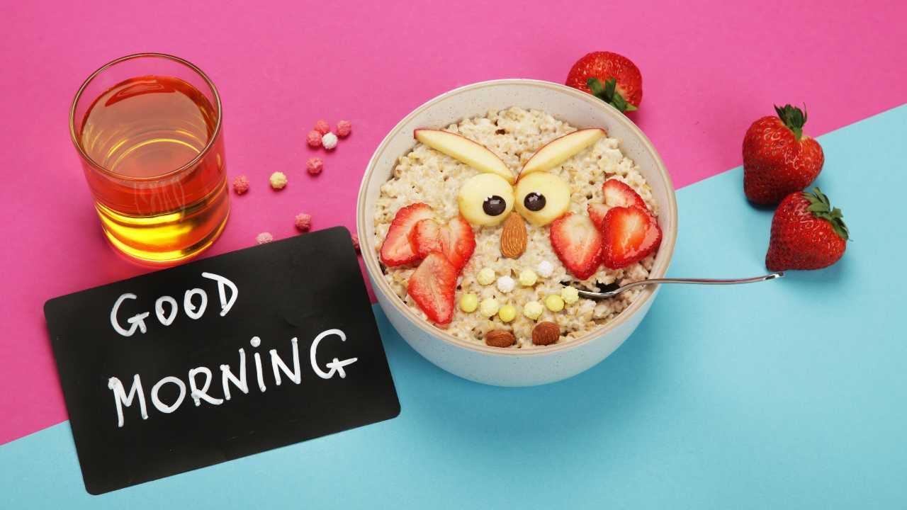 Creative oatmeal breakfast for kids on colourfull background Creative oatmeal breakfast for kids on colourfull background
